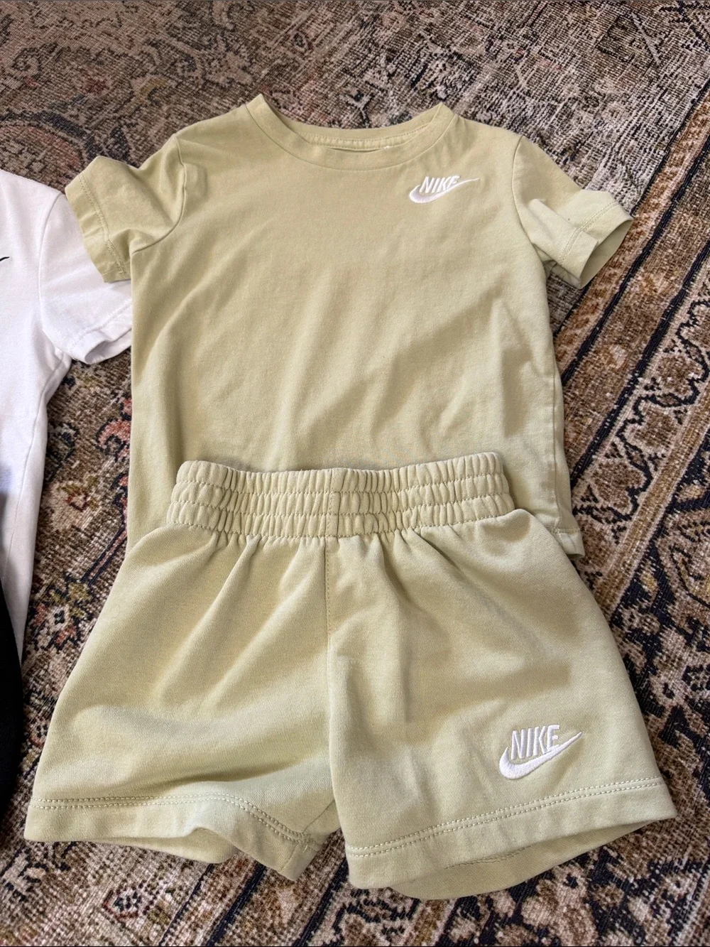 Four 2 pc Nike sets